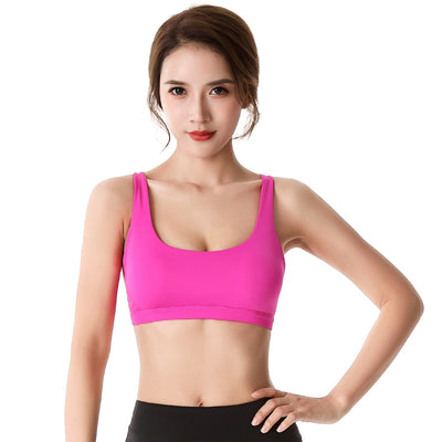 Crossed shoulder straps sports bra