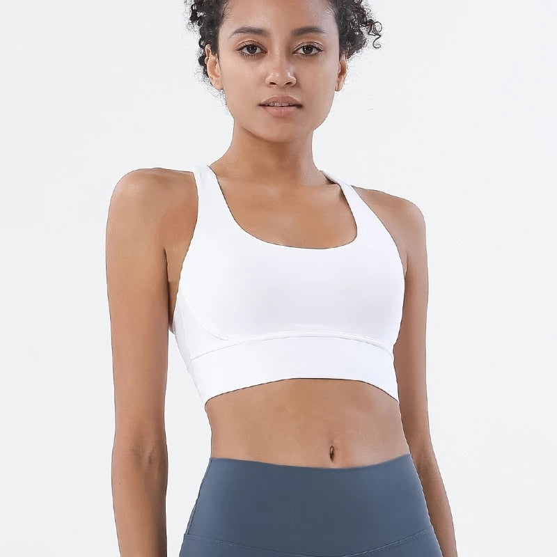 Sports bra with crossed shoulder straps