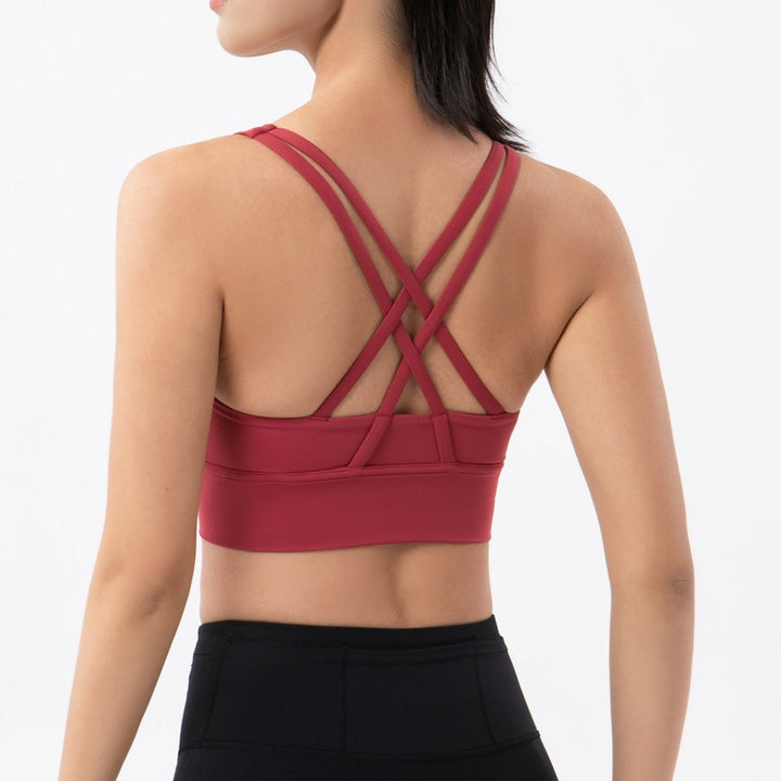 Sports bra with crossed shoulder straps