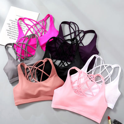 Crossed shoulder straps sports bra